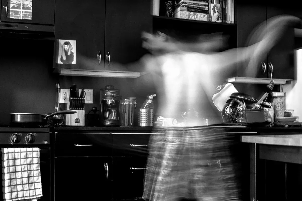 A person cooking in a kitchen